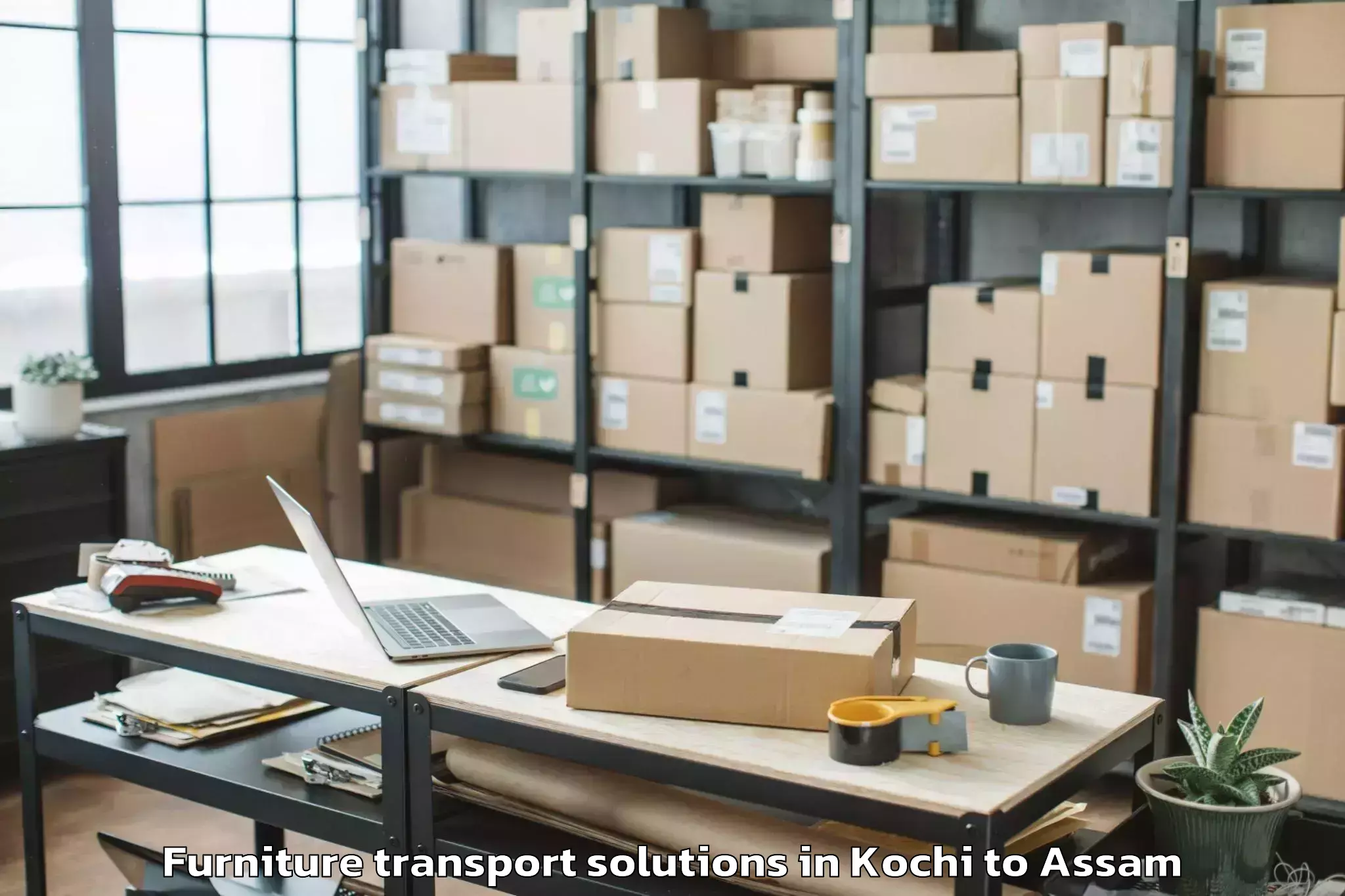 Top Kochi to Soalkuchi Furniture Transport Solutions Available